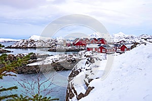 Landscape photography. Cloudy winter view of Nusfjord town, Norway, Europe. Morning scene of Lofoten Islands. Norwegian seascape