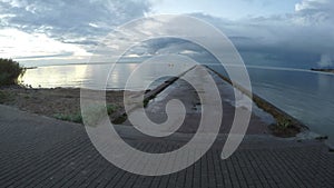 Landscape with a pier and buoys in Curonian Lagoon, time lapse 4K