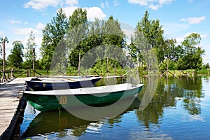 Landscape with pier of pleasure boats on Lake Valdai