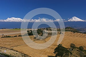 Popocatepetl and Iztaccihuatl volcanoes near puebla city XVIII photo