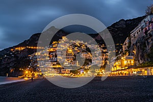 Landscape with Positano town at famous amalfi coast at night, Italy