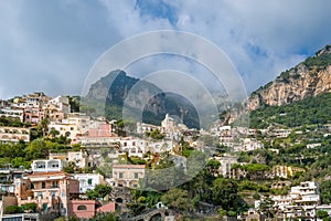 Landscape of Positano village with mountain range on the background