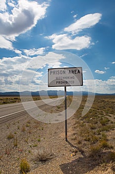 Landscape prison and warning sign