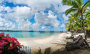 Landscape with public beach at Grand baie village on Mauritius island