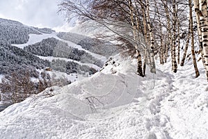 Landscape with Pyrenees Mountains in Andorra , Grandvalira ski area in El Tarter one winter day photo