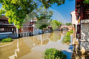 Landscape of Qibao Old Town in Shanghai, China. Brick bridge over the river in Qibao