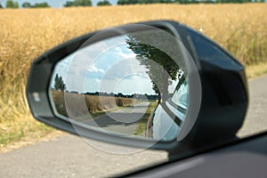 Landscape in the rear-view mirrors