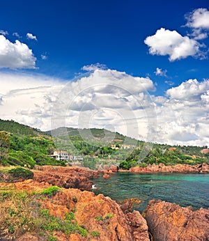 Landscape with red cliffs and dramatic blue sky
