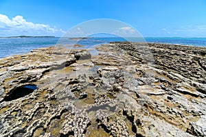 Landscape of reefs with rock formations of the natural pools of Praia dos Carneiros