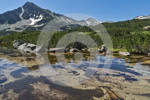 Landscape with Reflection of Sivrya peak in Banski lakes, Pirin Mountain