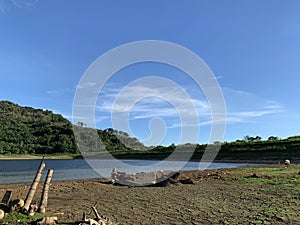 Landscape of reservoir with cracked mud in summer season