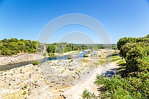 Landscape with a River Gard near the famous aqueduct Pont du Gard, France