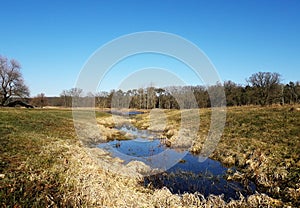 Landscape with river, just before spring is coming