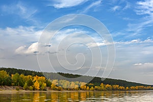 Landscape on the river, sky with clouds