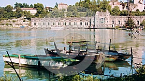 Landscape of a river with small fishing boats