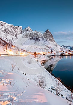 Landscape of road glowing on mountain in norwegian fishing villa