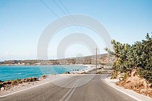 Landscape with road, hills and seashore Crete, Greece