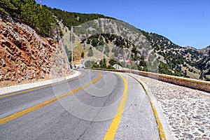 Landscape and road through mountains at western part of Crete island