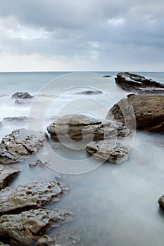 Landscape of rock coast and beautiful cloud