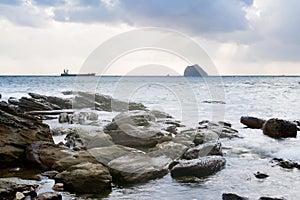 Landscape of rock coast and beautiful cloud