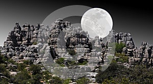 Landscape of rocky mountains with moonlight