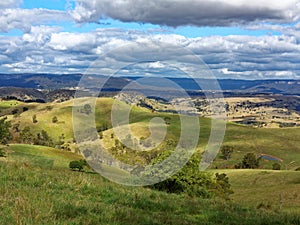 Landscape rolling hills Australian country with estates far view