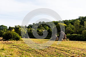 Landscape of a rural scene with haystacks