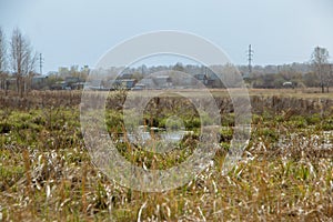 Landscape of the Russian countryside with a view of the houses in spring