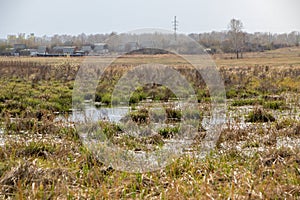 Landscape of the Russian countryside with a view of the houses in spring
