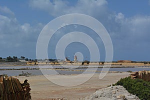 Landscape with salt mines and windmill at Marsala in Sicily