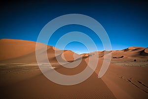 Landscape of sand dune and sandstone nature sculpture at Tamezguida in Tassili nAjjer national park, Algeria