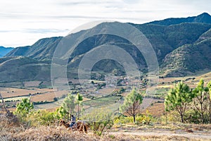 A man goes on horseback in the mountains of the town of Santa Rosa in the Municipality of Mascota Jalisco. photo