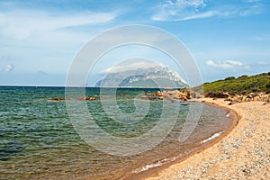 Landscape of the Sardinian sea surrounded by a beach near Porto Taverna, Italy