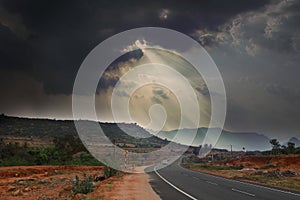 Landscape scene with road towards hill