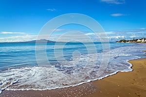 Landscape Scenery of Milford Beach Auckland New Zealand; View to Rangitoto Island during Sunny Day