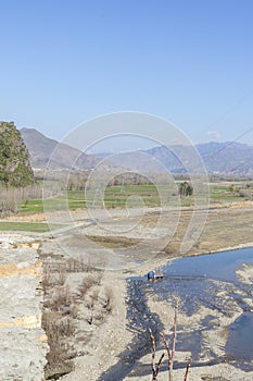 Landscape or scenery of a river and trees in winter