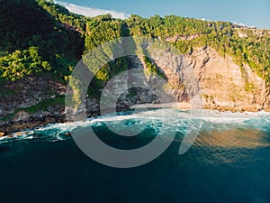 Landscape with scenic cliff, rocks and ocean in Bali. Aerial view