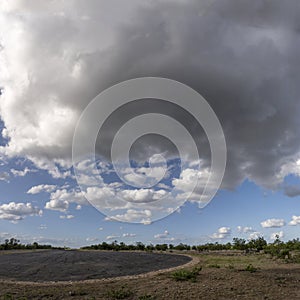 landscape with scenic clouds over paved airstrip at Kruger park, South Africa