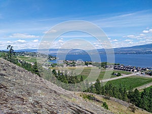 Landscape scenic overlook view of vinyards and farmland in Okanagan lake, West Kelowna, Okanagan Valley, BC, Canada