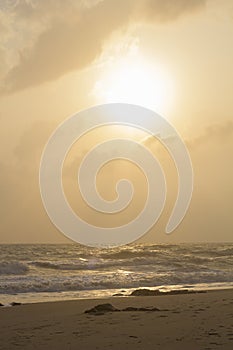 Landscape of sea, beach and cloudy sky on windy day