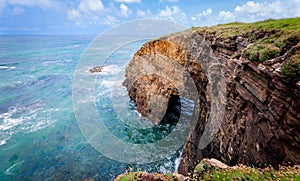 Landscape of sea, cliff blue sky with clouds.