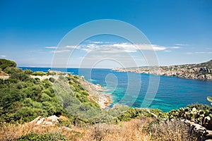 Landscape with Sea, Stones, Road and Coast of Santa Teresa di Gallura in North Sardinia Island photo