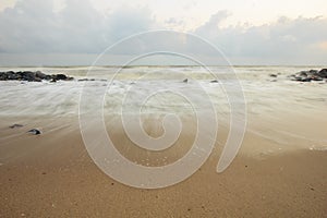 Landscape of sea which have breakwater and cloudy sky on windy day ; Songkhla Thailand