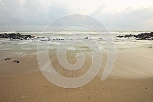 Landscape of sea which have breakwater and cloudy sky on windy day ; Songkhla Thailand