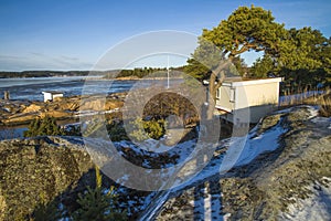 Landscape by the sea in the winter (outhouse)