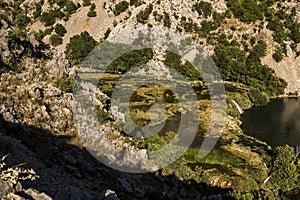 Landscape with a series of small waterfalls on Krupa river in Croatia