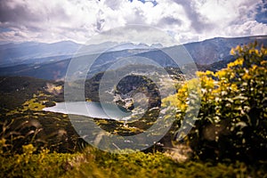 Landscape of the Seven Rila Lakes in Bulgaria.Beautiful nature shot,mountains.Reflecting water on sunny cloudy day.