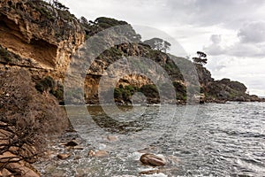 Landscape of Shelley Cove near Bunker Bay, Eagle Bay in Western Australia with rocky beach in overcast weather