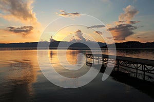 Landscape shot of a dock on the beautiful Lake Ohrid during sunset - great for wallpapers
