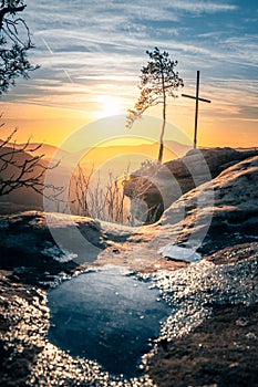 Four castles view, RÃÂ¶tzenfels, a sandstone rock with a cross and a tree. Sunrise, fog, Palatinate Forest, Germany. landscape shot